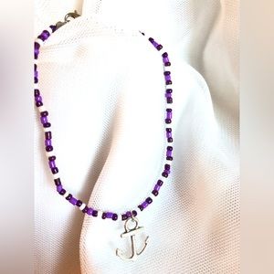 DV awareness hand beaded bracelet made while watching Johnny Depp trial